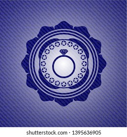 diamond ring icon inside emblem with denim texture