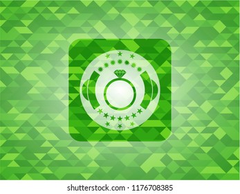 diamond ring icon inside green mosaic emblem
