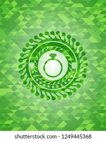 diamond ring icon inside green emblem with mosaic ecological style background