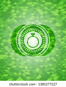 diamond ring icon inside green emblem. Mosaic background