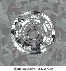 diamond ring icon inside grey camouflage emblem