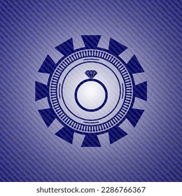 diamond ring icon inside jean background. 