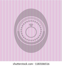 diamond ring icon inside pink emblem