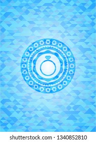 diamond ring icon inside realistic light blue mosaic emblem