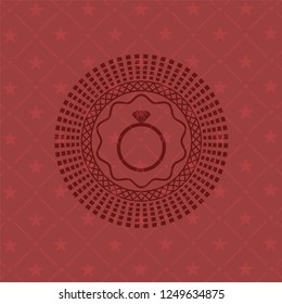 diamond ring icon inside red emblem