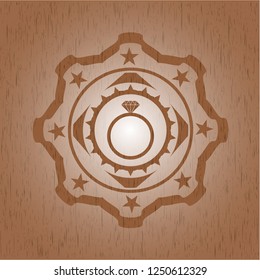 diamond ring icon inside retro wood emblem
