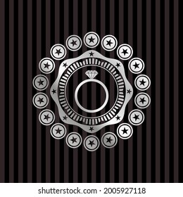 diamond ring icon inside silver shiny emblem. 