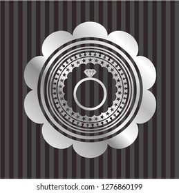 diamond ring icon inside silvery badge