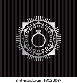 diamond ring icon inside silvery badge or emblem