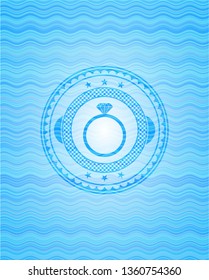diamond ring icon inside water wave representation emblem background.