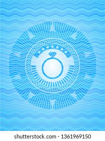 diamond ring icon inside water wave concept style emblem.
