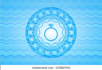diamond ring icon inside water wave representation style badge.