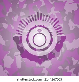 diamond ring icon on pink and purple camo pattern. 
