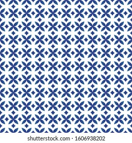 Diamond seamless geometric pattern. Decorative blue diamonds and flowers on isolated white background. Design for porcelain, ceiling, texture, paper, wall, background.