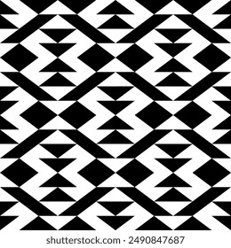 Diamonds, rhombuses, lozenges, tiles, triangles, arrows seamless pattern. Ethnic ornate. Folk ornament. Geometric image. Tribal wallpaper. Geometrical background. Retro motif. Ethnical textile print.