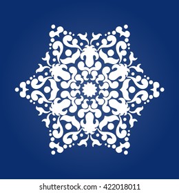 Die cut paper card with cutout mandala ornament. 