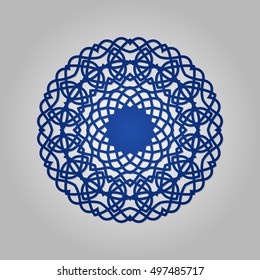 Die cut paper card with cutout mandala ornament.