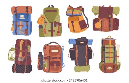 Different backpacks for travel with camping accessories and hiking equipment isolated on white