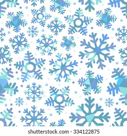 Different blue snowflakes. Abstract seamless background