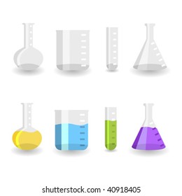 Different chemistry beakers empty and full with colored liquids
