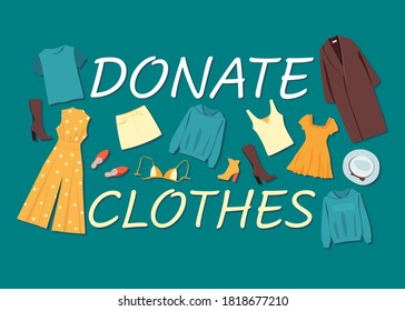 Different clothes on a green background. Clothing donation
