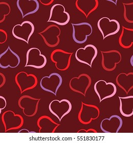 Different color hearts pattern on crimson background.