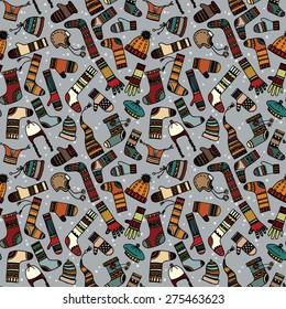 Different Colored Fashionable hand drawn hats,socks and mittens.Autumn ,winter ,spring wear.Background,fabric,wallpaper .Fashion Vector.