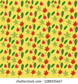 different colorful leaves on yellow background