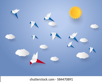 Different concept , Flock of birds flying in the sky, paper art style