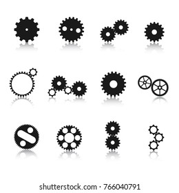 Different engineering gear wheel silhouettes with reflections
