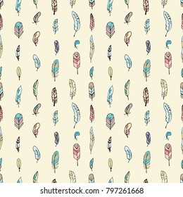 Different feathers are painted in delicate colors painted on a light background. Seamless pattern.