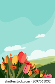 Different flowers on the meadow. Natural scenery in portrait format.