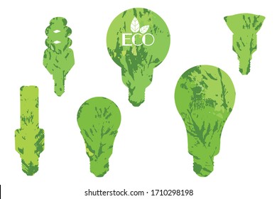 Different form light bulbs silhouettes set. Basis green Eco clip art on white background