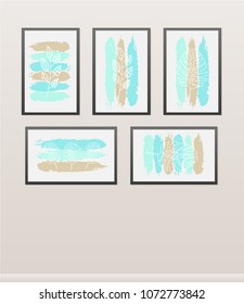 Different framed paintings hanging on the wall as decorative objects.