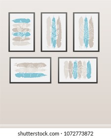 Different framed paintings hanging on the wall as decorative objects.