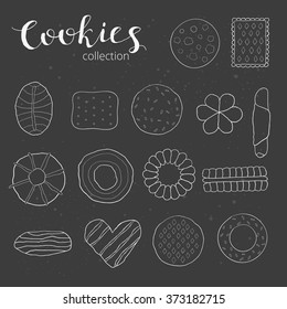 Different hand drawn cookies isolated on the blackboard.