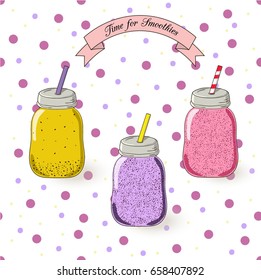  Different kind of smoothies in glass cans set on the light dotted background.