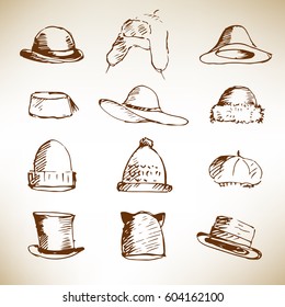 Different kinds of hand drawn hats.Sketch, vector illustration.