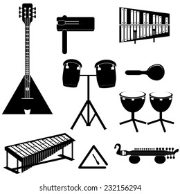 Different musical instruments: balalaika, different drums, marimba, rattle, triangle, sitar and si strum