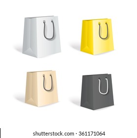 Different paper shopping bags isolated on white