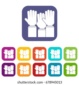 Different people hands raised up icons set vector illustration in flat style In colors red, blue, green and other