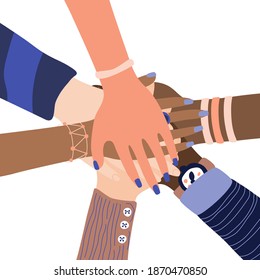 Different people join hands in a fit of teamwork. A group of people strives for a common goal in their work. Together strength, confidence and result. Friendship and helping each other in unity.