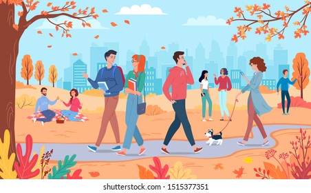 Different people walking in the autumn city park