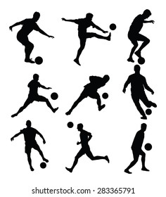 Different poses of soccer players vector silhouette isolated on white background. Football  players.