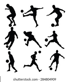 Different poses of soccer players vector silhouette illustration isolated on white background. Football players silhouette.