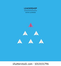 A different red paper rocket flying lead from others. Business concept of talent, leadership, teamwork, creativity and recruitment.