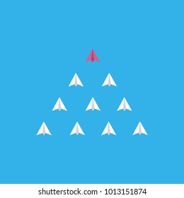 A different red paper rocket flying lead from others. Business concept of talent, leadership, teamwork, creativity and recruitment.