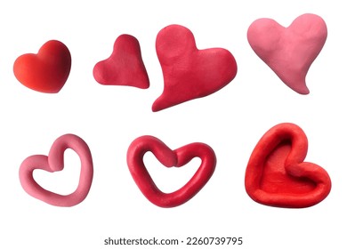 Different red and pink hearts made of handmade plasticine. Vector graphics.