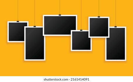 different shapes photo frames on yellow background