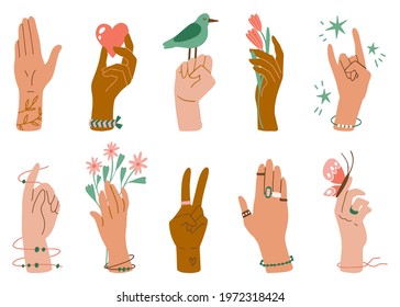 Different skin colors hands with flowers, bird, butterfly, bracelets, rings. Hand drawn flat vector. Human palms, wrists, gestures.  Diverse society illustration. Race and cultural equality svg